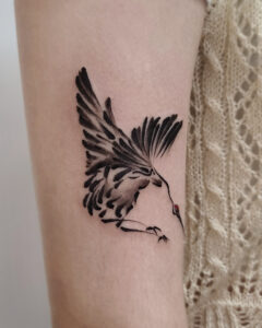Minimal Korean crane in flight tattoo