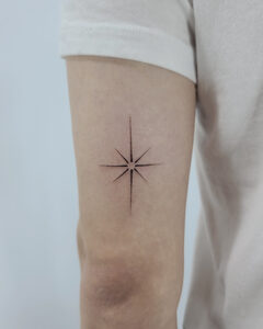 Four-point sparkle star mini tattoo on the shoulder, Seoul